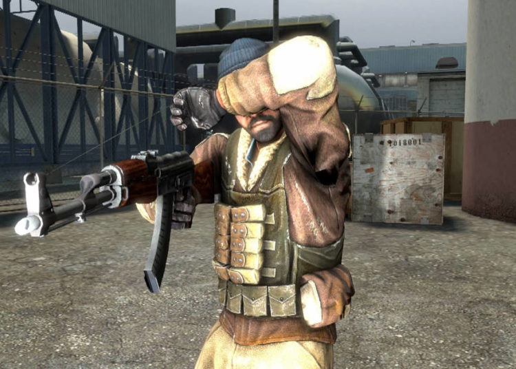 A terrorist CS:Go character covering his eyes because of a flashbang.